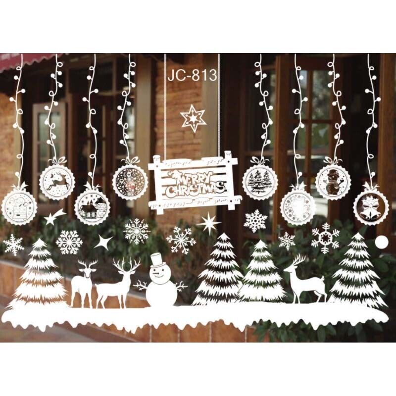 Christmas themed window decals featuring trees and snowflakes