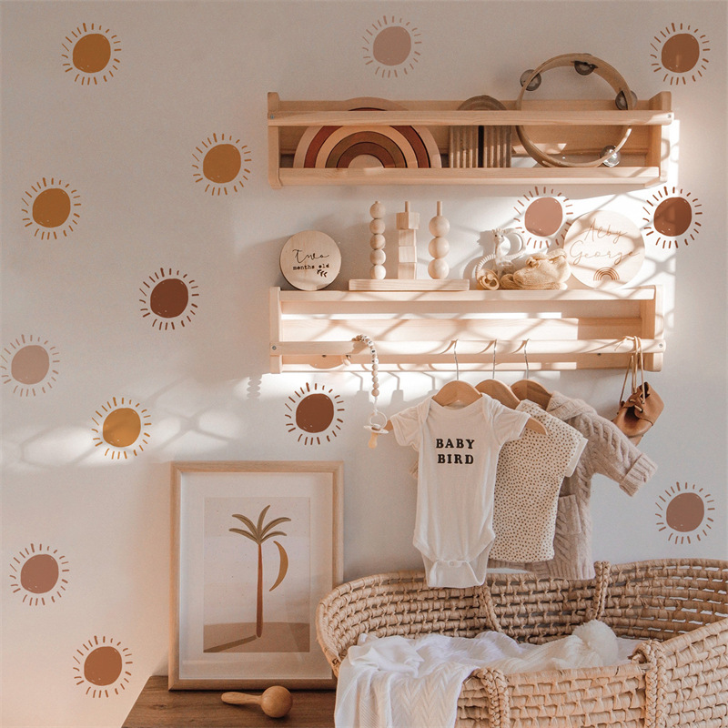 Cartoon sun wall sticker for children's room decoration.
