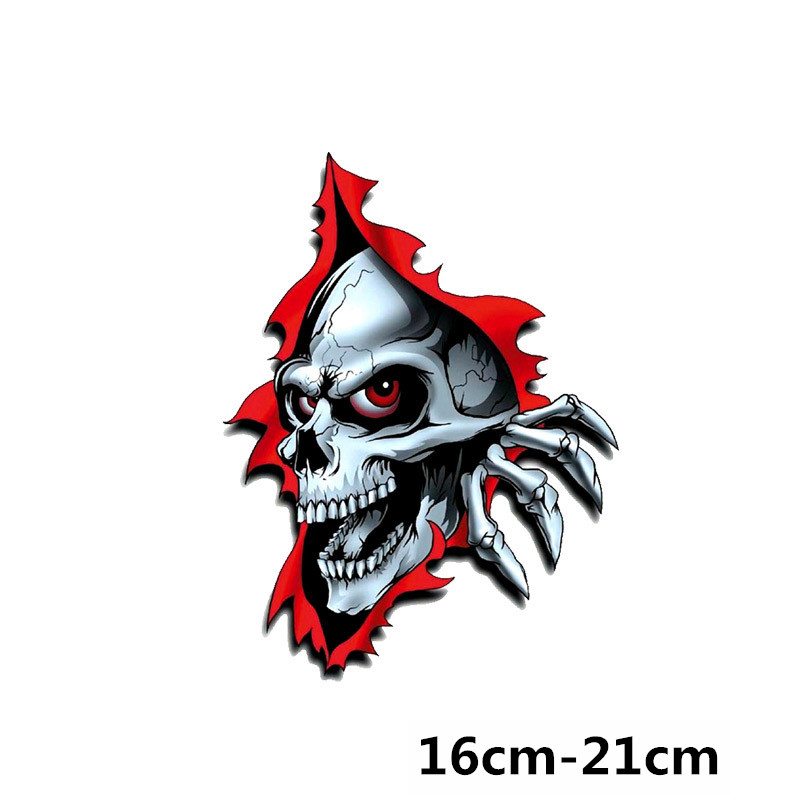 Skull design emerging from a hole sticker